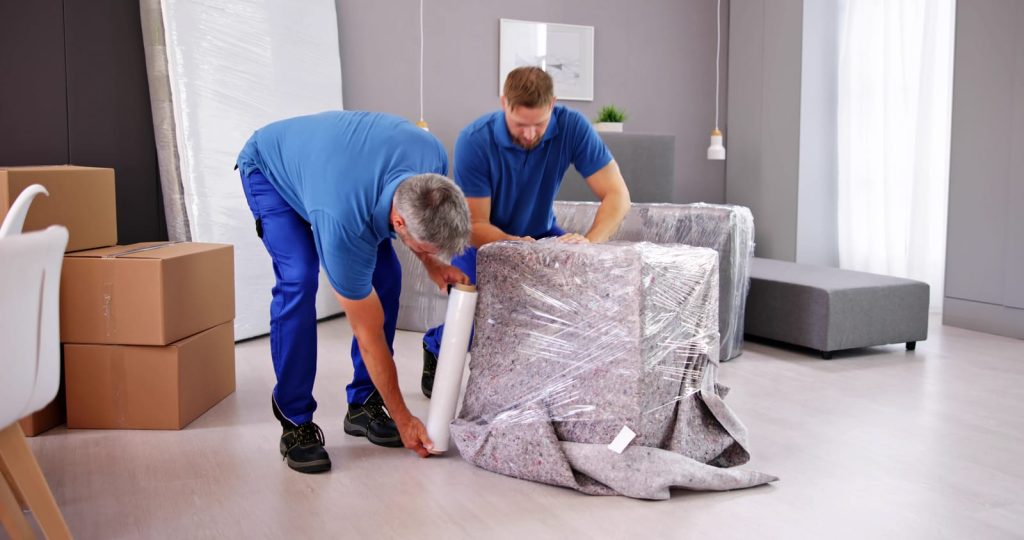 89075722-professional-furniture-movers-wrapping